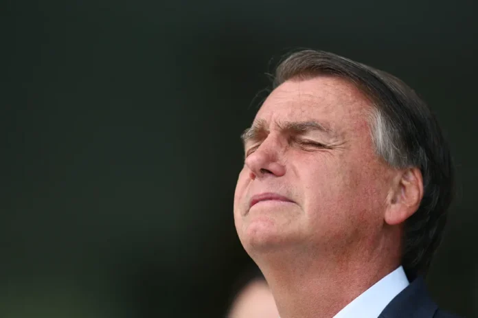100739287-brazilian-president-and-re-election-candidate-jair-bolsonaro-gestures-as-he-speaks-to-the.webp