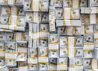 Dólar cai a R$ 5,14 com alívio no mercado externo